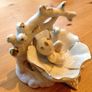 Beautiful porcelain baby in a flower Image 4
