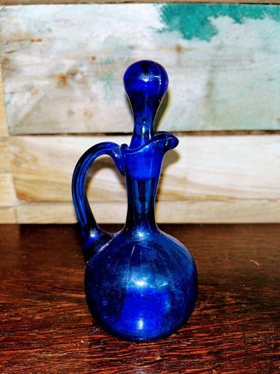Antique cobalt blue pitcher with lid