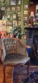 French walnut and green velvet armchair