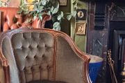French walnut and green velvet armchair