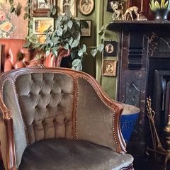 French walnut and green velvet armchair