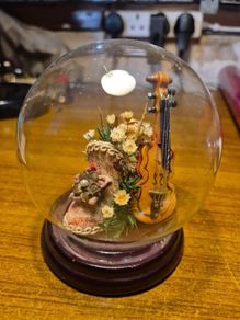 Vintage Globe with Country Meadow Flowers in a Fancy Show and Violin Decoration.
