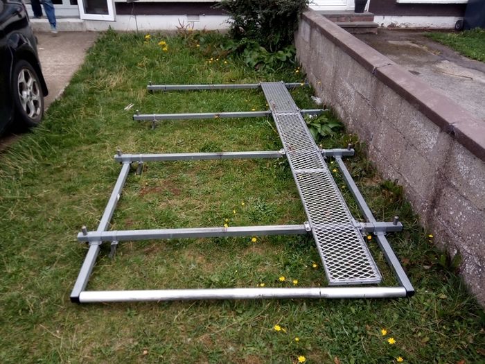 van roof rack for vivaro trafic primastar 3 years old great condition has a ladder roll bar on back for easy putting or taking off of ladders and tie cage on top of it too