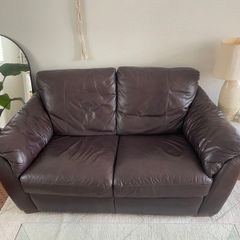 Leather couch comfortable with some marks