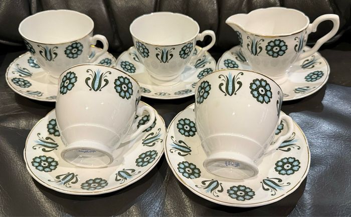 Mayfair Bone China 4 Cups & 5 Saucers and jug.