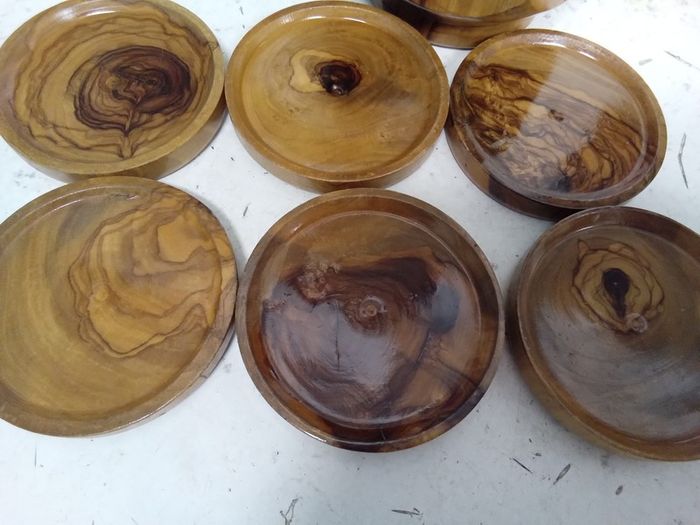 set of olive wood coasters