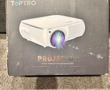 Tiptop Home Projector like ne condition comes with all accessories and a 100" cloth projector screen.