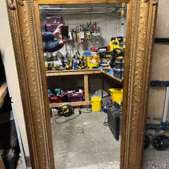 Mirror in sturdy frame