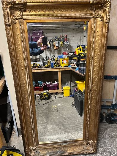 Mirror in sturdy frame