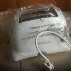 Cook works toaster with warming rack