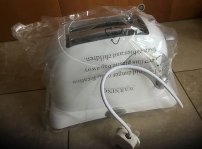 Cook works toaster with warming rack