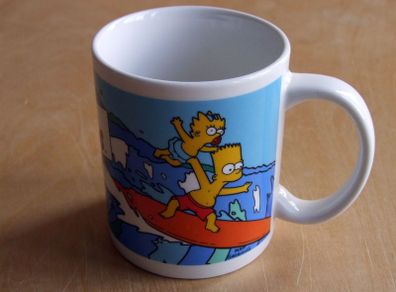 The Simpsons Bart and Maggie surfing mug