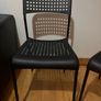 Black plastic chairs Image 2