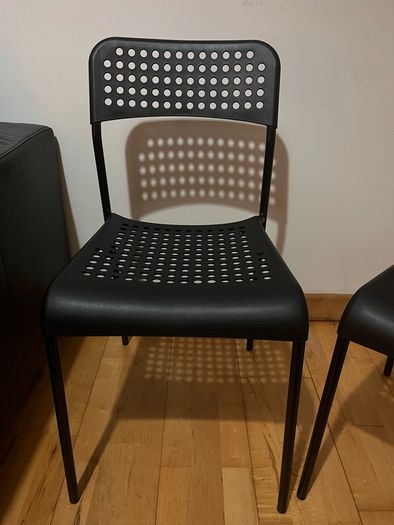 Black plastic chairs