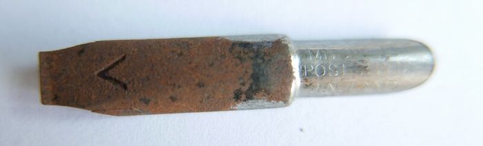 Vintage dip pen with collection of assorted nibs