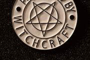 Protected by witchcraft, Pin back badge.