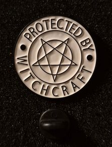 Protected by witchcraft, Pin back badge.