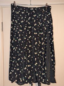 Stunning floral and doot midi skirt