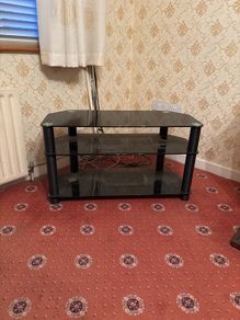 Black glass tv stand
