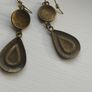 Vintage-style long bohemian drop earrings featuring turquoise enamel and a bronze-tone metal finish. Image 5