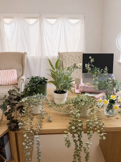Collection of fake plants and pots