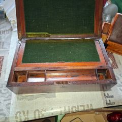 19th Century Victorian writing slope. It features a hinged lid that opens to create a sloped writing surface, traditionally lined with velvet. The box includes built-in compartments for storing pens, inkwells, and documents., postage available