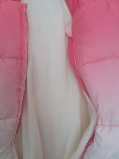 New baby girl snowsuit padded with fleece lining throughout .New .No tags but never worn .12 euro .