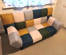 Sofa bed with mattress topper