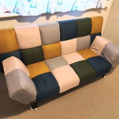 Sofa bed with mattress topper