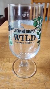 Orchard thieves wild cider glass