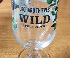 Orchard thieves wild cider glass