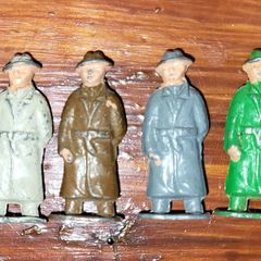 vintage cast iron little men