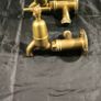 2 sets of Old brass taps Image 7