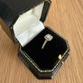 18ct yellow gold solitaire with diamond surround Image 3