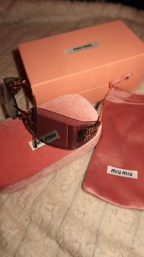 Miu Miu Glasses