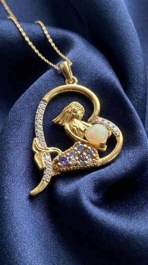 Silver Mermaid in Heart Pendant by Harry Ivens