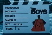 The boys display scene clap board