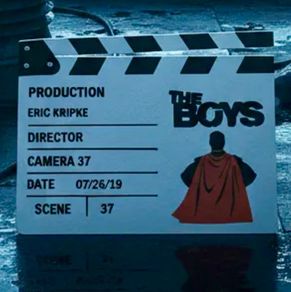 The boys display scene clap board