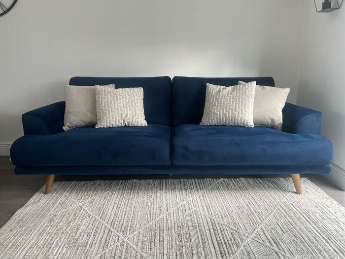 Navy velvet sofa and cuddle chair from Michael Murphy furniture