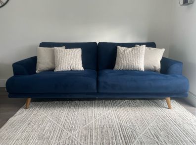 Navy velvet sofa and cuddle chair from Michael Murphy furniture