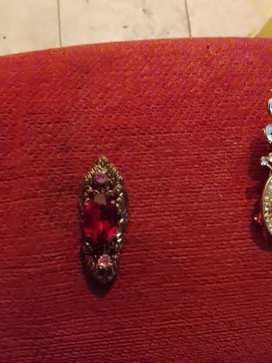 Gold plated brooches