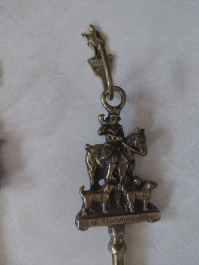 Antique French fireplace set 1950s features handles with various figures with animal finials