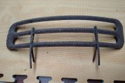 Clip on fire grate coal saver