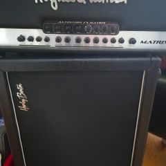 Hughes & Kettner Matrix 100 solid-state guitar amp head paired with a speaker cabinet.