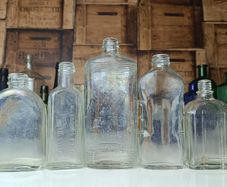 489 - Set of 7 Vintage Clear Glass Screw Cork Top Collectible Decorative Bottles