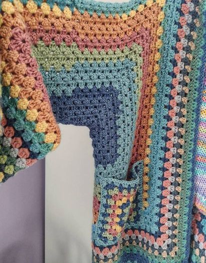 Crocheted colourful hexagon jacket