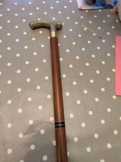 Collapsible wooden walking stick with decorative handle