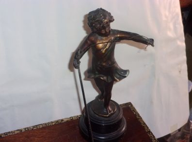 antique metal figure of a shepherd