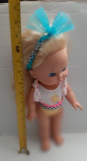 collectable vintage matel doll in original clothes