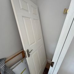 Three white solid wood interior doors for sale